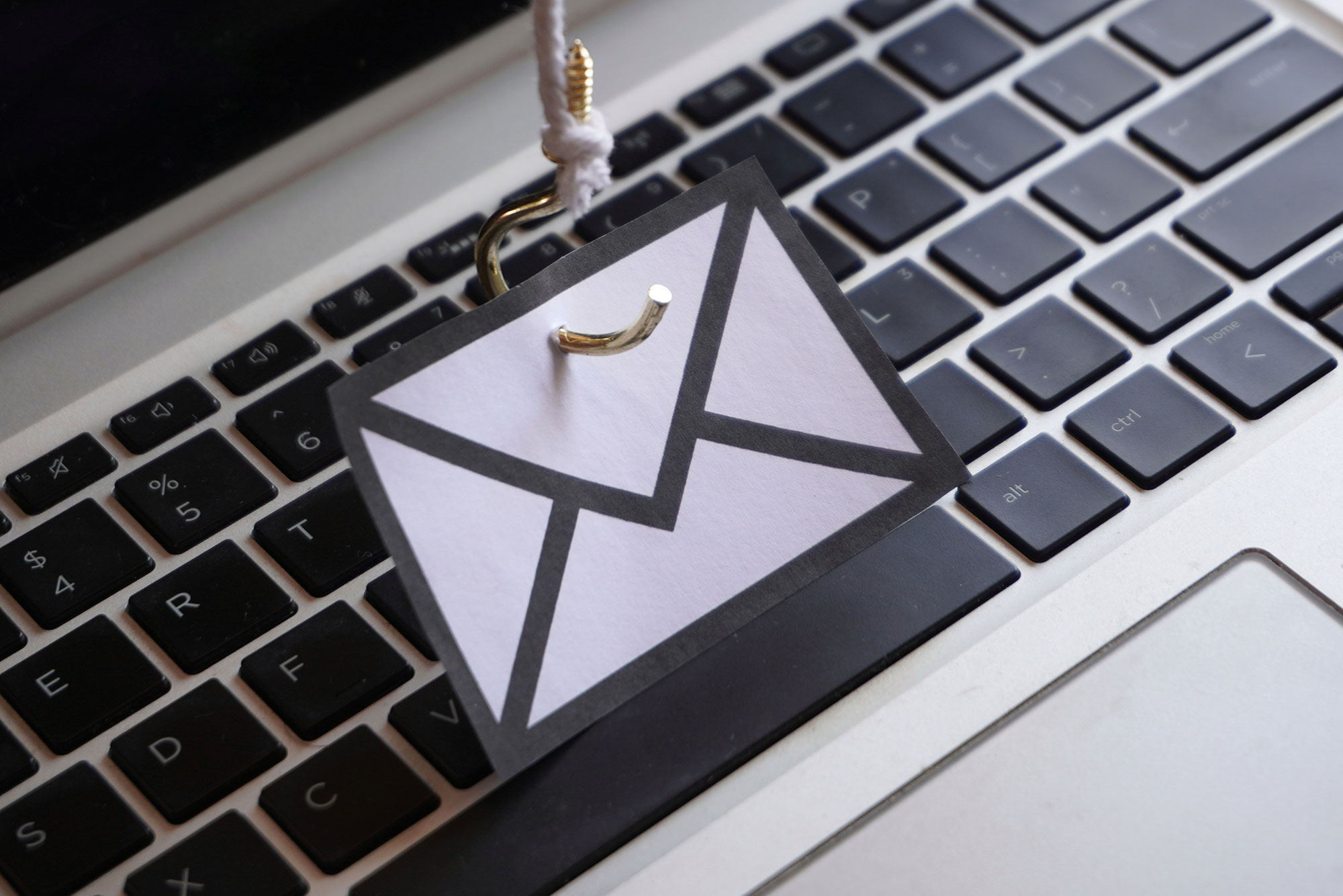 image of hook on computer indicating phishing scams